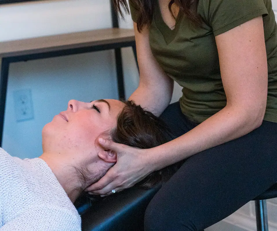 Dr. Natalie treating jaw pain and TMJ in Mississauga